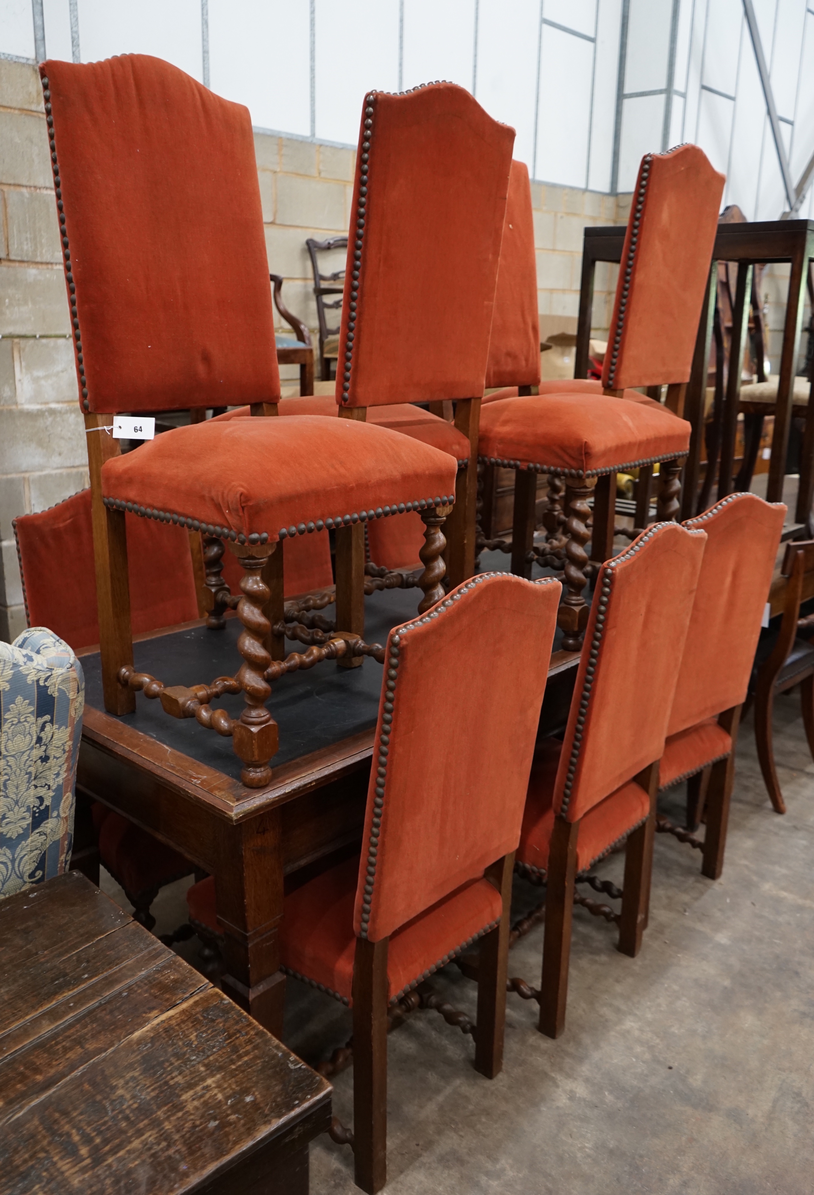 A set of ten Carolean design upholstered oak dining chairs